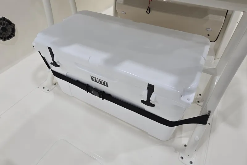 Slide: The Image of YETI cooler secured on 2026 Boston Whaler 220 Dauntless boat deck. - 35
