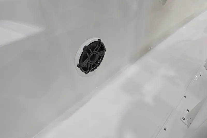 Slide: The Image of 2026 Boston Whaler 220 Dauntless interior with speaker detail. - 37