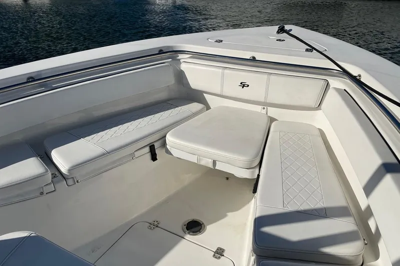 Slide: The Image of Steering console of 2026 Sailfish 272 CC boat with modern controls and display. - 2