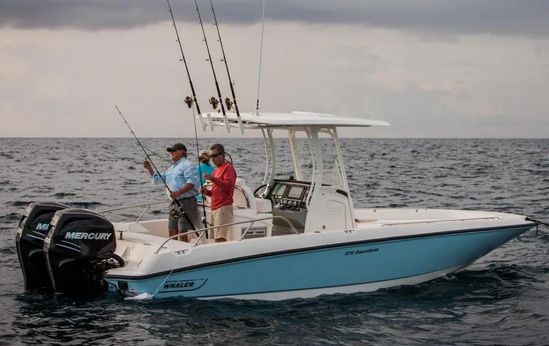 Slide: The Image of Manufacturer Provided Image: 2014 Boston Whaler 270 Dauntless boat with anglers fishing in open water. - 3