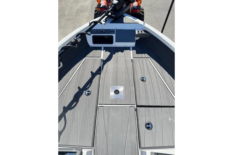 Slide: The Image of 2026 Vexus ADX 190 boat deck with sleek gray finish and storage compartments. - 14