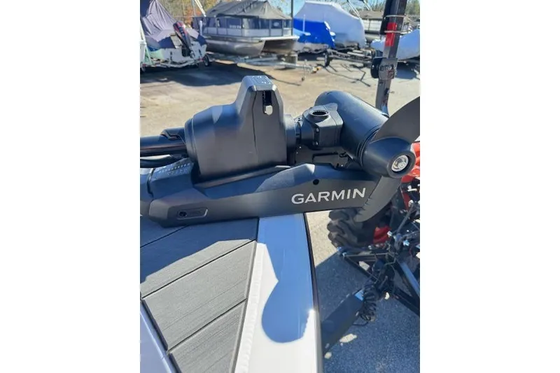 Slide: The Image of 2026 Vexus ADX 190 boat with Garmin equipment in a marina setting. - 21