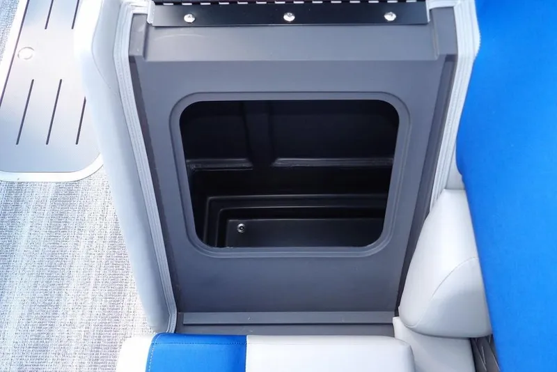 Slide: The Image of 2026 Bennington S Quad Bench 22 SSR with blue and gray seating on a boat deck. - 12