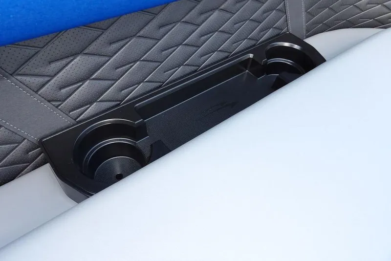 Slide: The Image of 2026 Bennington S Quad Bench 22 SSR with blue and gray upholstery on a boat deck. - 14