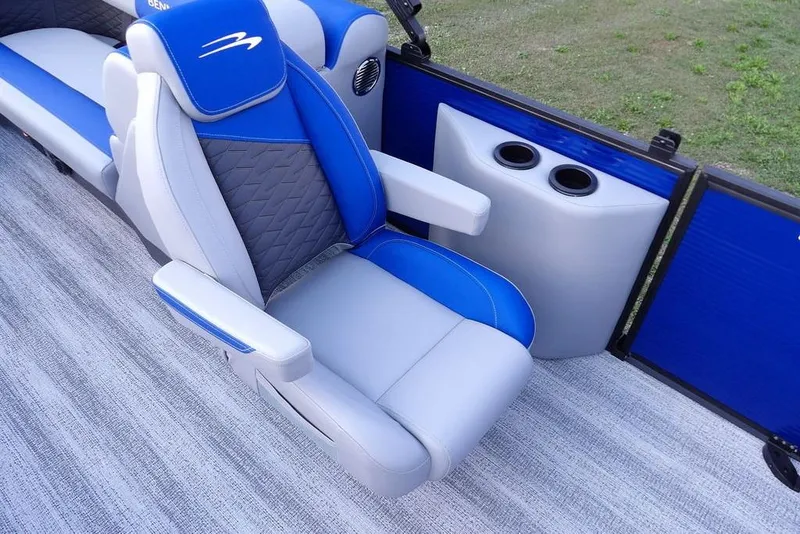 Slide: The Image of 2026 Bennington S Quad Bench 22 SSR interior with blue and gray seating. - 20