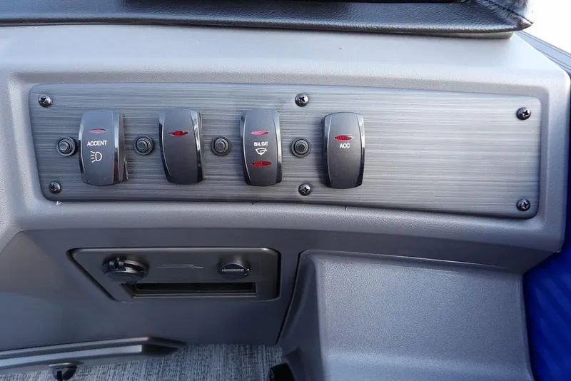 Slide: The Image of Control panel of 2026 Bennington S Quad Bench 22 SSR boat with labeled switches. - 29