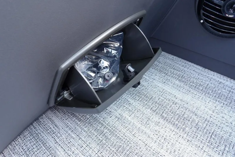 Slide: The Image of Storage compartment in 2026 Bennington S Quad Bench 22 SSR boat interior. - 31