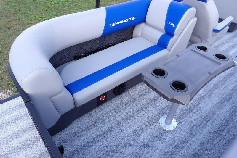 Slide: The Image of Interior of 2026 Bennington S Quad Bench 22 SSR with speaker and control panel. - 34