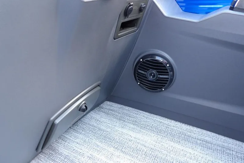 Slide: The Image of 2026 Bennington S Quad Bench 22 SSR with blue and gray seating and cupholder table. - 35