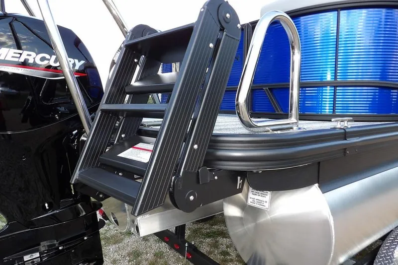 Slide: The Image of 2026 Bennington S Quad Bench 22 SSR boat with Mercury engine and boarding ladder. - 45