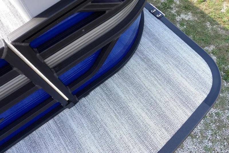 Slide: The Image of 2026 Bennington S Quad Bench 22 SSR pontoon boat, blue and gray detail. - 9