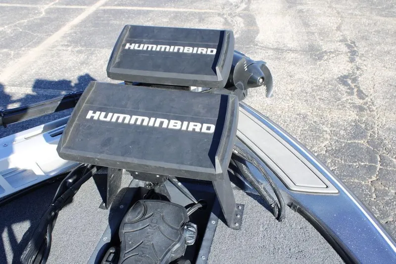 Slide: The Image of 2003 Skeeter ZX250 boat with dual Humminbird fish finders on deck. - 11