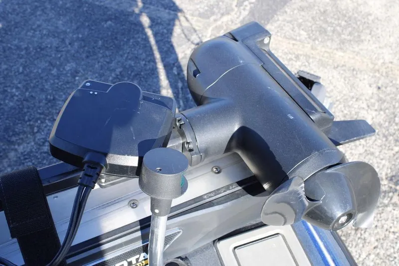 Slide: The Image of Close-up of a 2003 Skeeter ZX250 boat motor and propeller. - 12