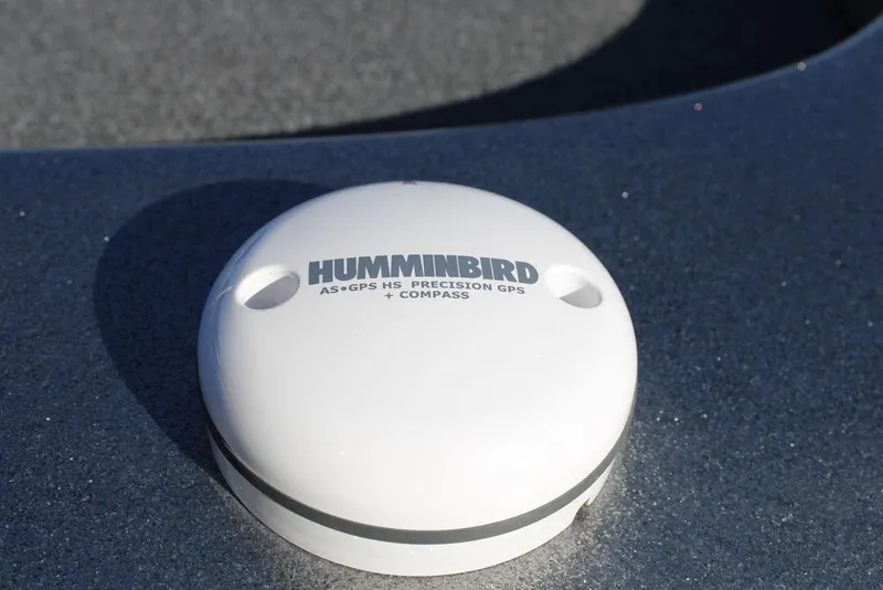 Slide: The Image of Humminbird GPS device on 2003 Skeeter ZX250 boat deck. - 17