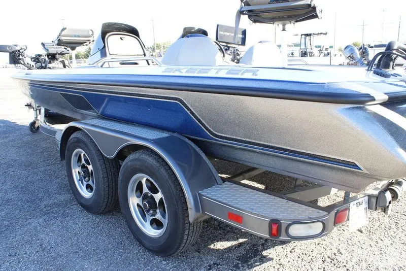 Slide: The Image of 2003 Skeeter ZX250 boat on trailer, side view, metallic finish. - 22