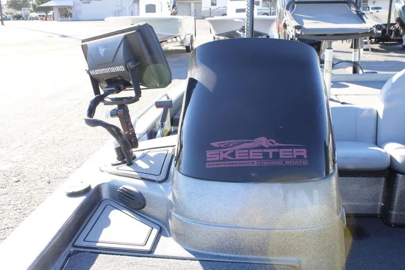 Slide: The Image of 2003 Skeeter ZX250 fishing boat with Humminbird fish finder on deck. - 9