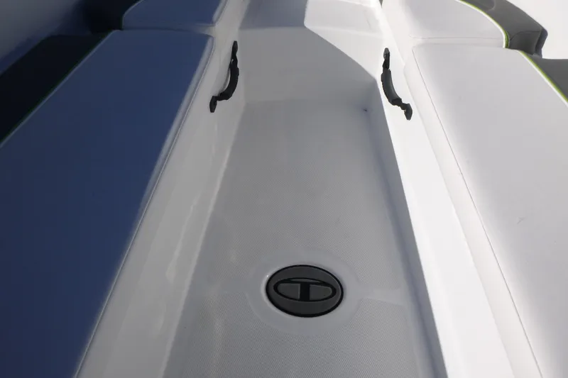 Slide: The Image of 2024 Tahoe T18 boat interior with seating and storage compartment. - 20
