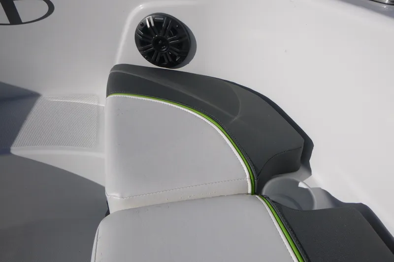 Slide: The Image of 2024 Tahoe T18 boat interior with speaker and cushioned seating. - 24