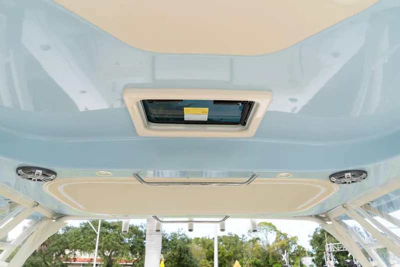 Slide: The Image of 2024 Grady-White Freedom 307 boat ceiling with hatch and speakers. - 38