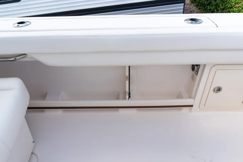 Slide: The Image of 2024 Grady-White Freedom 307 boat interior storage compartment detail. - 47