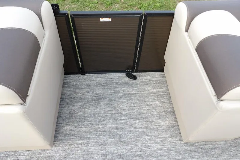 Slide: The Image of 2026 Bennington S Swingback 22 SSB interior seating with gate, featuring gray upholstery. - 20