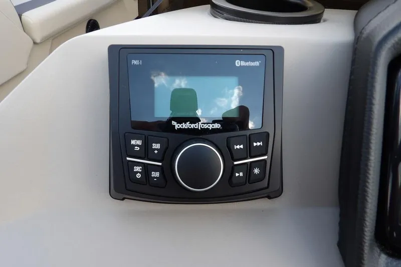 Slide: The Image of Rockford Fosgate audio system on 2026 Bennington S Swingback 22 SSB boat dashboard. - 24