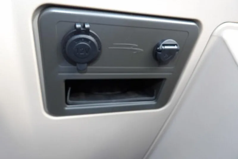 Slide: The Image of Dashboard panel with 12V socket on 2026 Bennington S Swingback 22 SSB. - 30