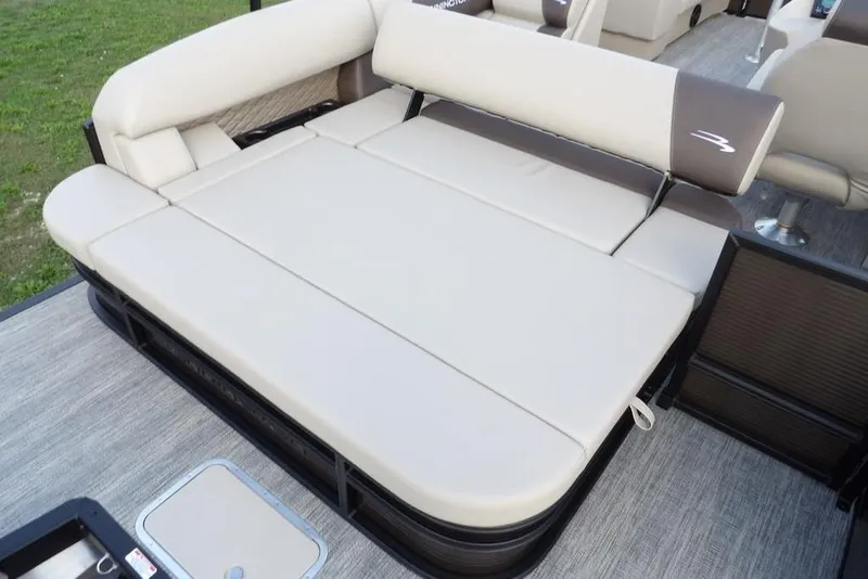 Slide: The Image of 2026 Bennington S Swingback 22 SSB boat with spacious beige seating area. - 40
