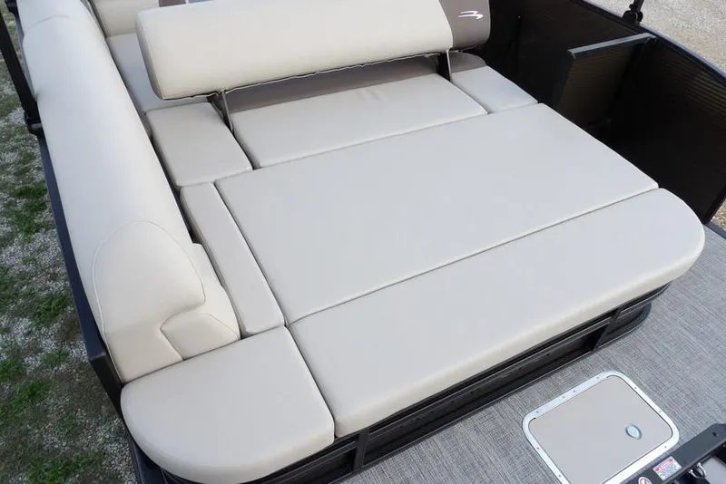 Slide: The Image of 2026 Bennington S Swingback 22 SSB boat with spacious beige seating area. - 42