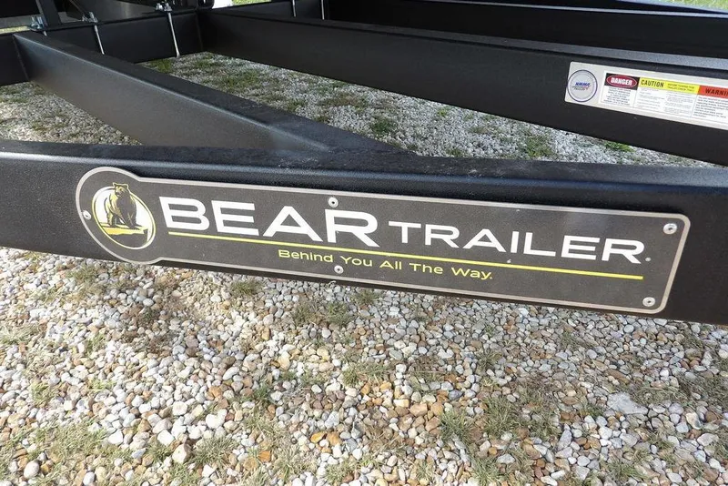 Slide: The Image of Bear Trailer logo on a trailer frame, gravel background, 2026 Bennington S Swingback 22 SSB. - 46