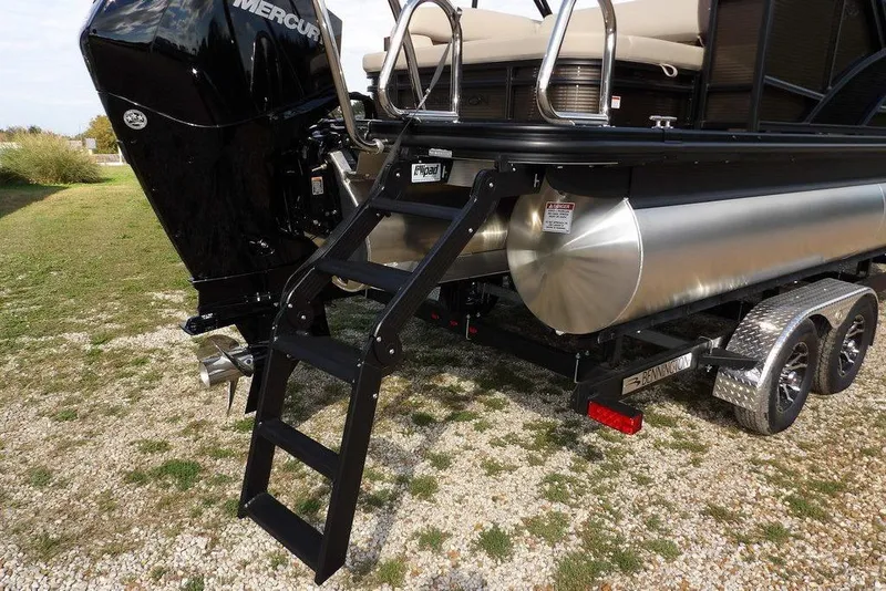 Slide: The Image of 2026 Bennington S Swingback 22 SSB pontoon boat with Mercury engine and trailer. - 51