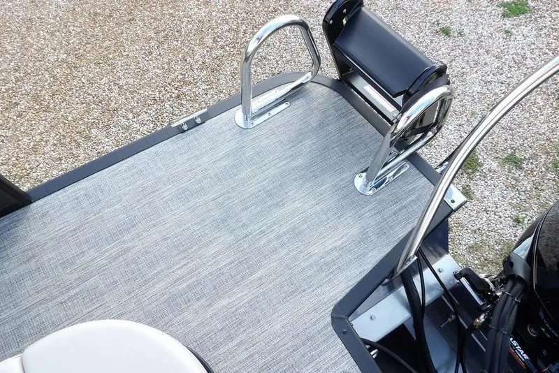 Slide: The Image of 2026 Bennington S Swingback 22 SSB boat deck with ladder and textured flooring. - 60