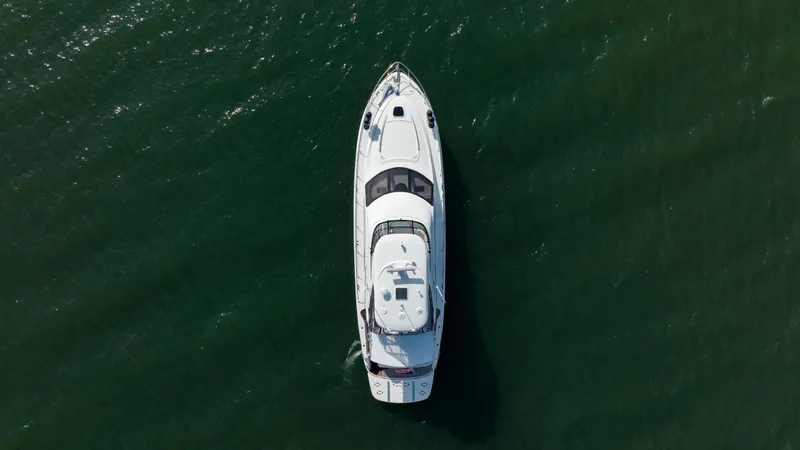 Slide: The Image of Aerial view of 2008 Sea Ray 52 Sedan Bridge yacht on open water. - 15