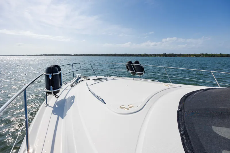 Slide: The Image of Bow view of 2008 Sea Ray 52 Sedan Bridge yacht on open water. - 29