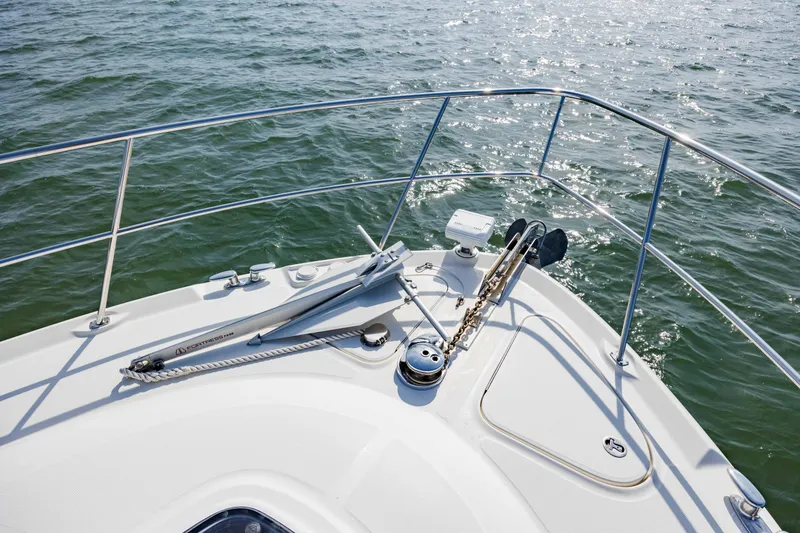 Slide: The Image of Bow of 2008 Sea Ray 52 Sedan Bridge yacht on water. - 30