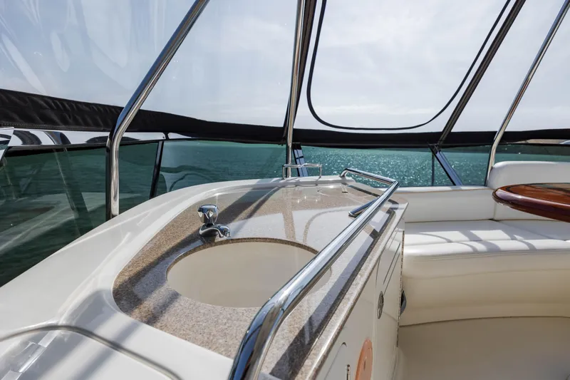 Slide: The Image of Luxurious 2008 Sea Ray 52 Sedan Bridge yacht interior with ocean view. - 43