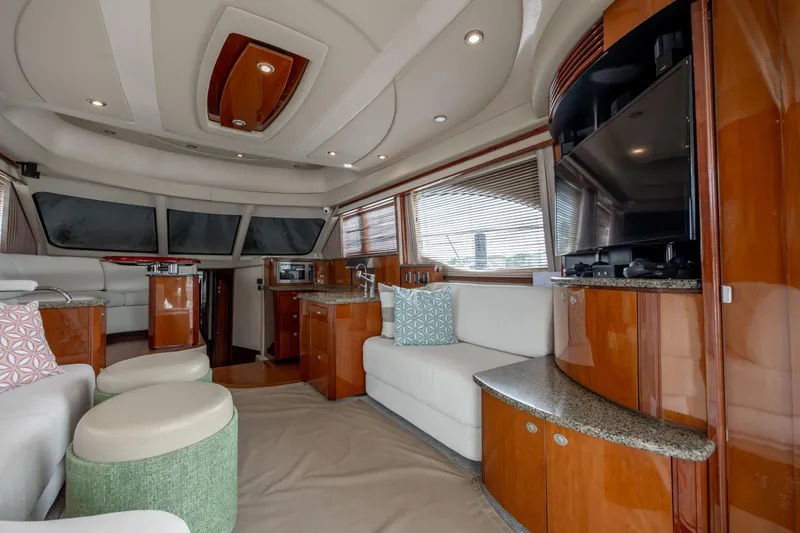 Slide: The Image of Luxurious interior of 2008 Sea Ray 52 Sedan Bridge yacht with modern furnishings. - 48