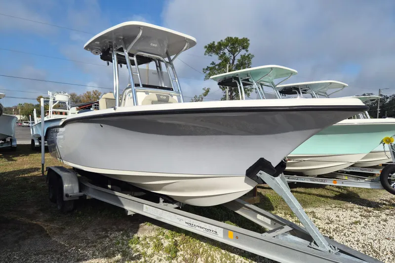 Slide: The Image of 2026 Key West 239 FS boat on trailer, displayed outdoors under clear sky. - 3