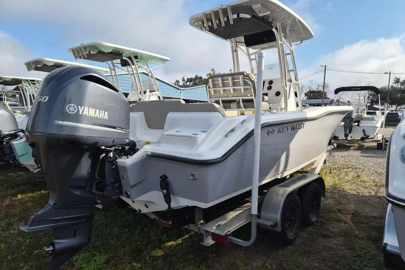 Slide: The Image of 2026 Key West 239 FS boat with Yamaha engine on trailer in outdoor lot. - 4
