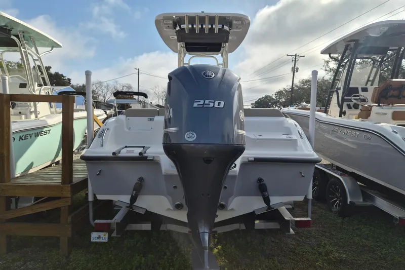 Slide: The Image of 2026 Key West 239 FS boat with Yamaha 250 engine, displayed outdoors. - 5