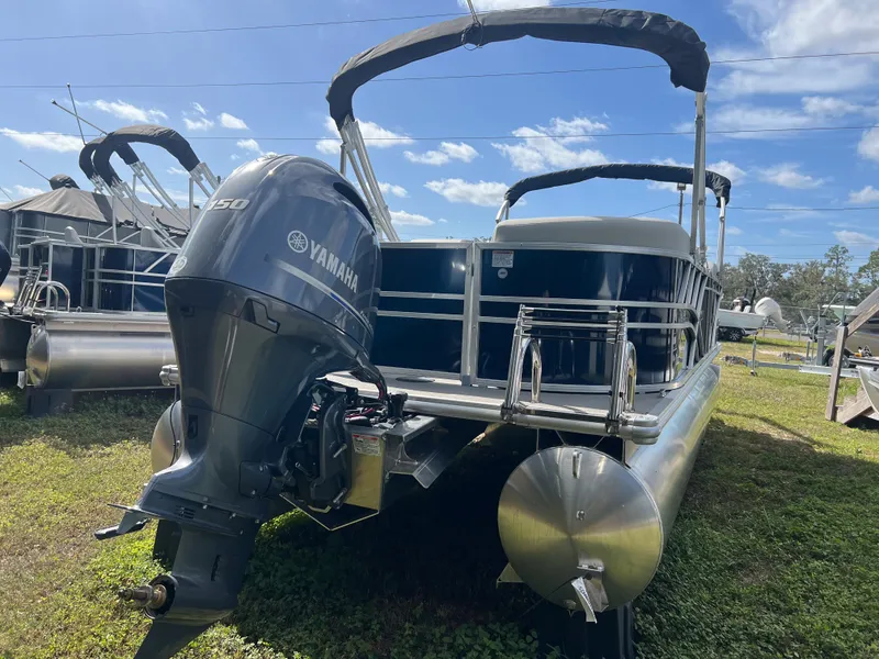 Slide: The Image of 2025 Sylvan Mirage 822 LZ pontoon boat with Yamaha engine on grassy lot. - 3