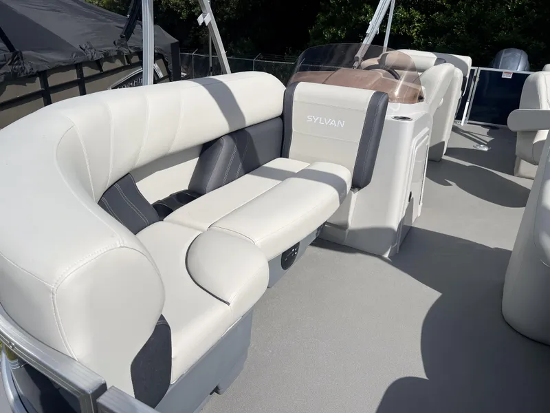 Slide: The Image of 2025 Sylvan Mirage 822 LZ pontoon boat with luxurious seating and modern design. - 5
