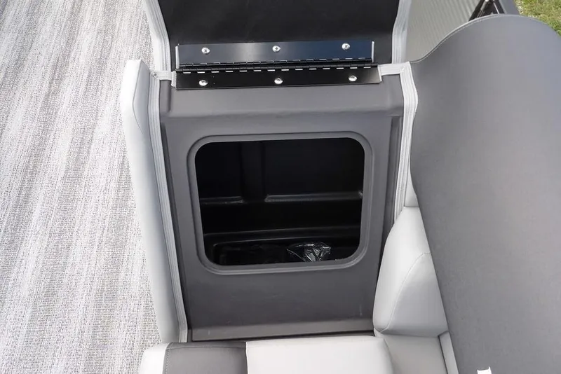 Slide: The Image of Storage compartment in 2026 Bennington S Swingback 21 SSB boat, featuring sleek design and functionality. - 14