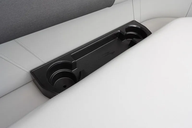 Slide: The Image of 2026 Bennington S Swingback 21 SSB cup holders on sleek white seating. - 19