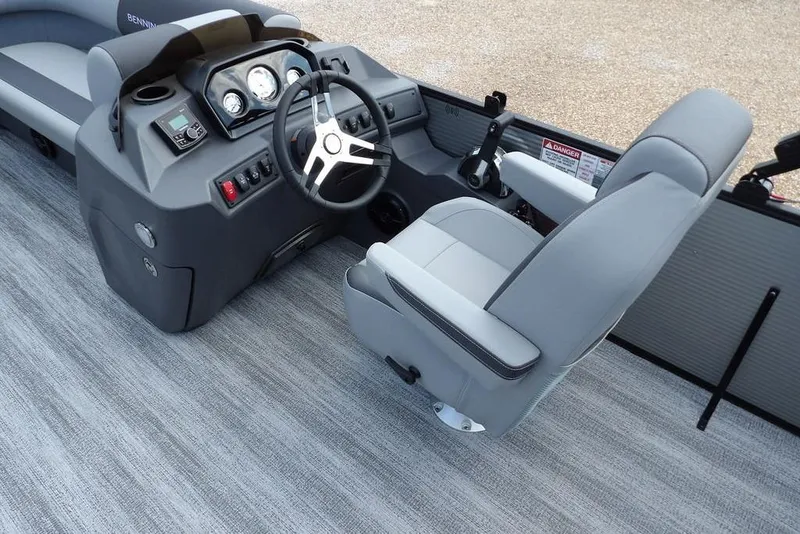 Slide: The Image of 2026 Bennington S Swingback 21 SSB boat interior with modern helm and seating. - 23