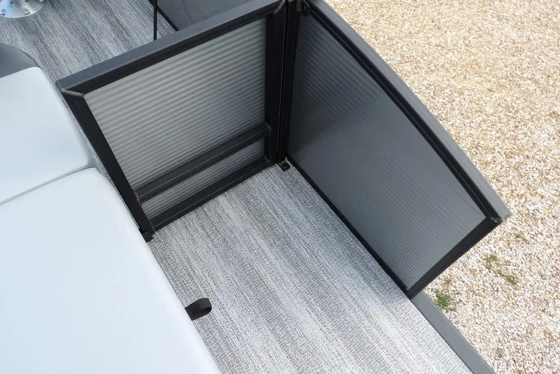 Slide: The Image of 2026 Bennington S Swingback 21 SSB boat interior with open gate and seating. - 38