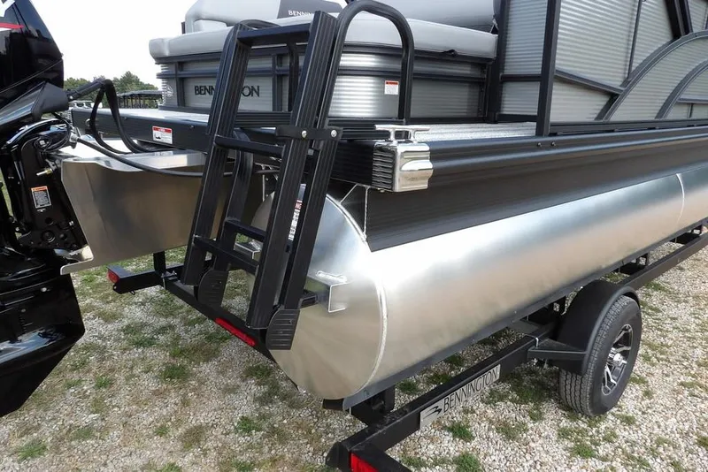Slide: The Image of 2026 Bennington S Swingback 21 SSB pontoon boat with ladder and trailer. - 42