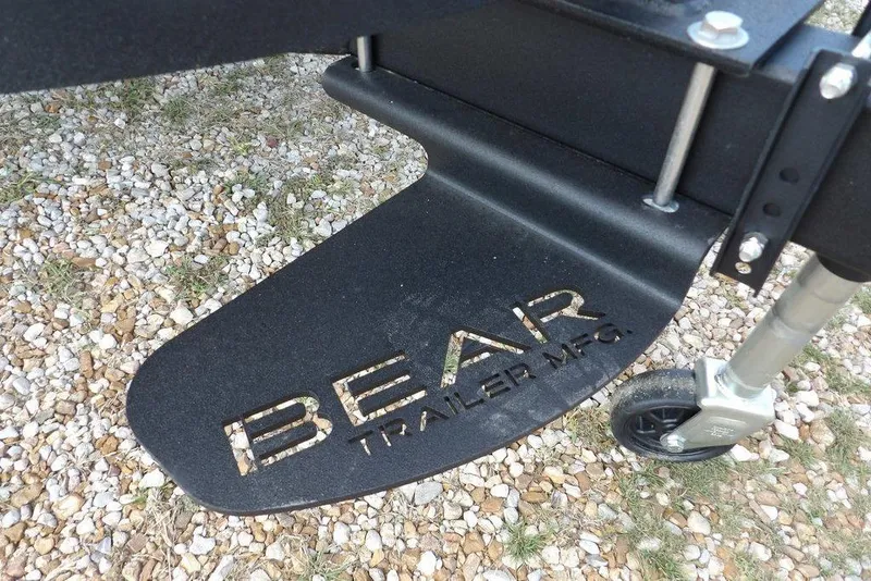 Slide: The Image of Trailer part with "BEAR TRAILER MFG" logo, gravel background, 2026 Bennington S Swingback 21 SSB. - 44
