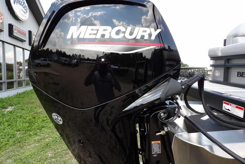 Slide: The Image of 2026 Bennington S Swingback 21 SSB with Mercury outboard motor, outdoor display. - 54