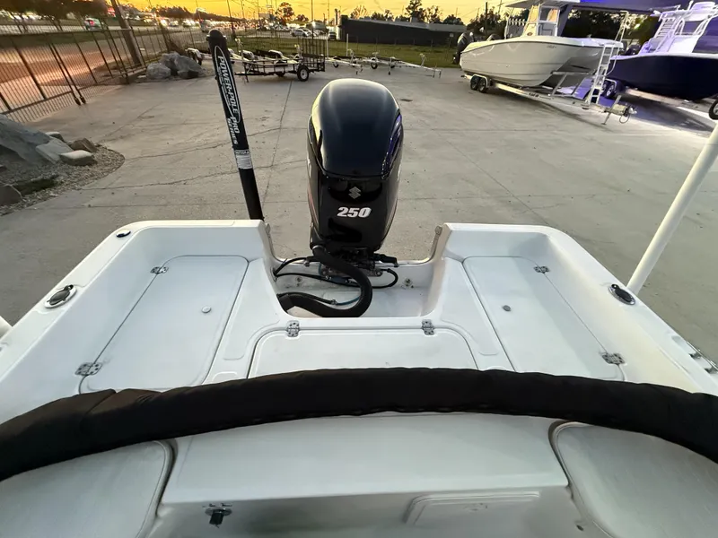 Slide: The Image of 2006 Sea Fox Bay Fisher 225 boat with Suzuki 250 outboard motor at sunset. - 11